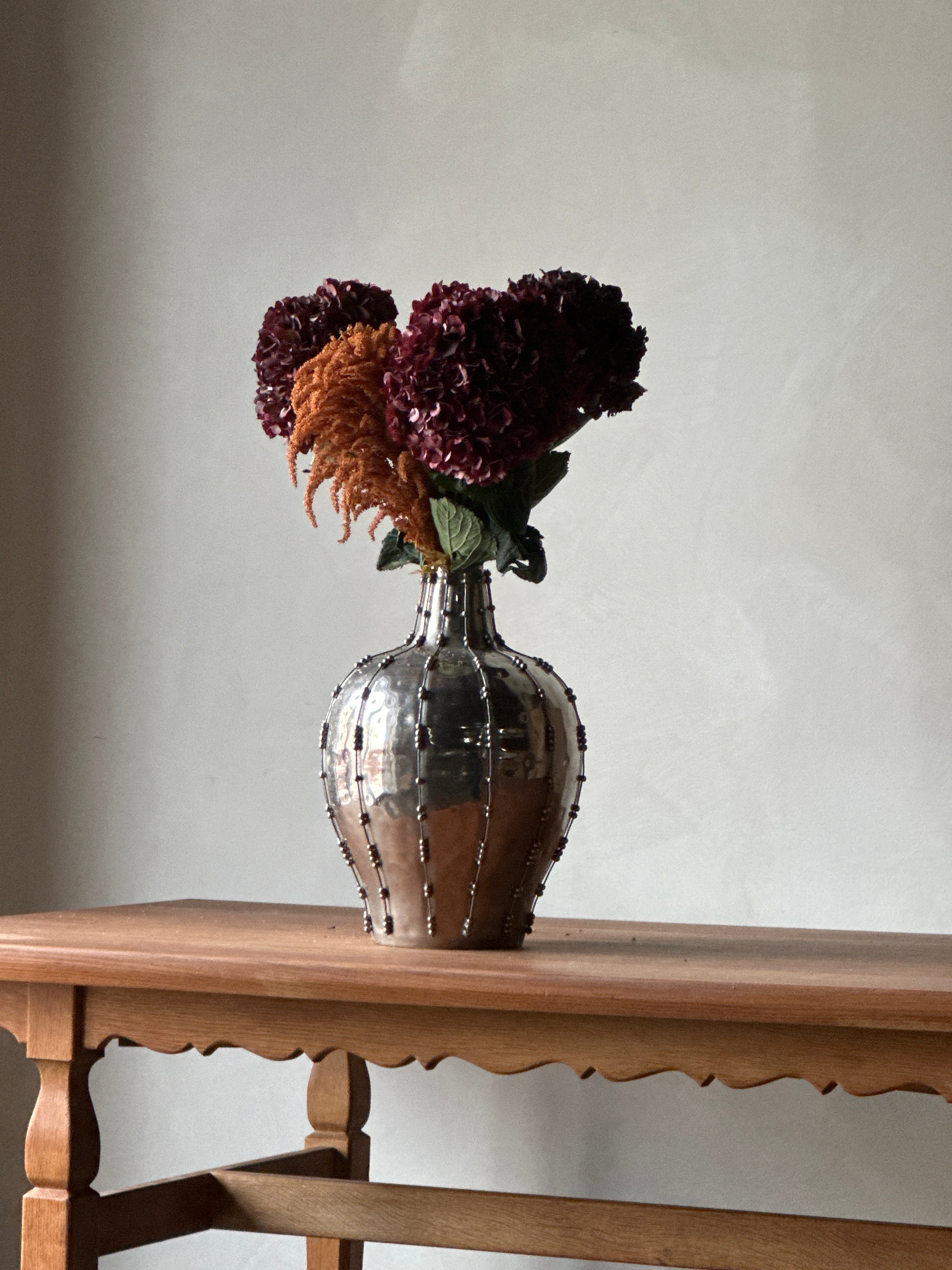 Studded Metal Vessel